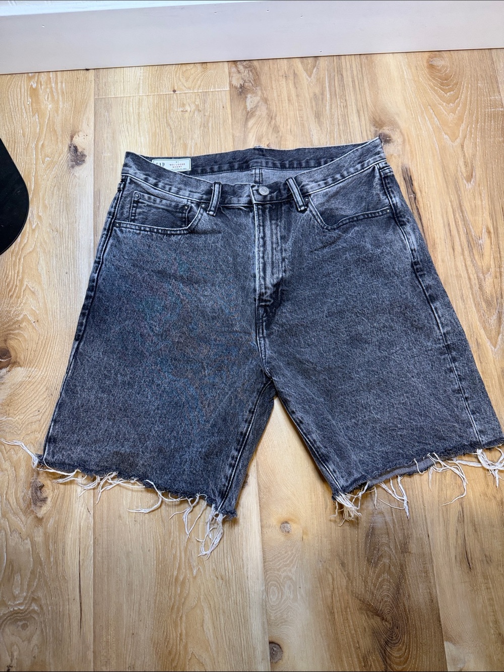 Men's Washed Black Denim Cutoff Shorts by gap size 31